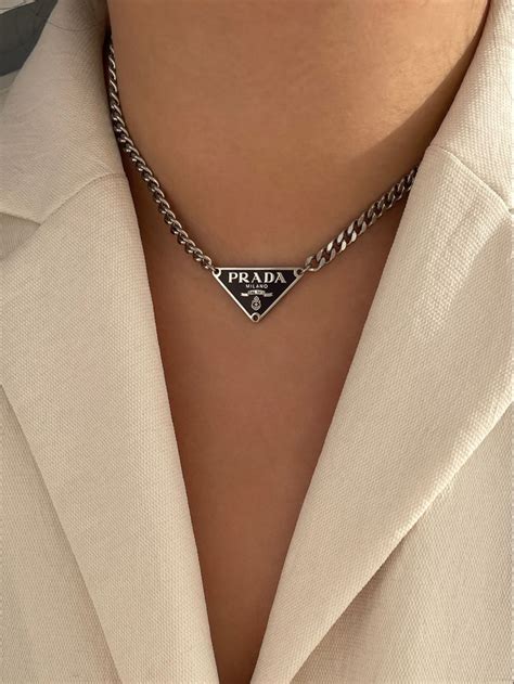 blue prada necklace|Prada necklace.